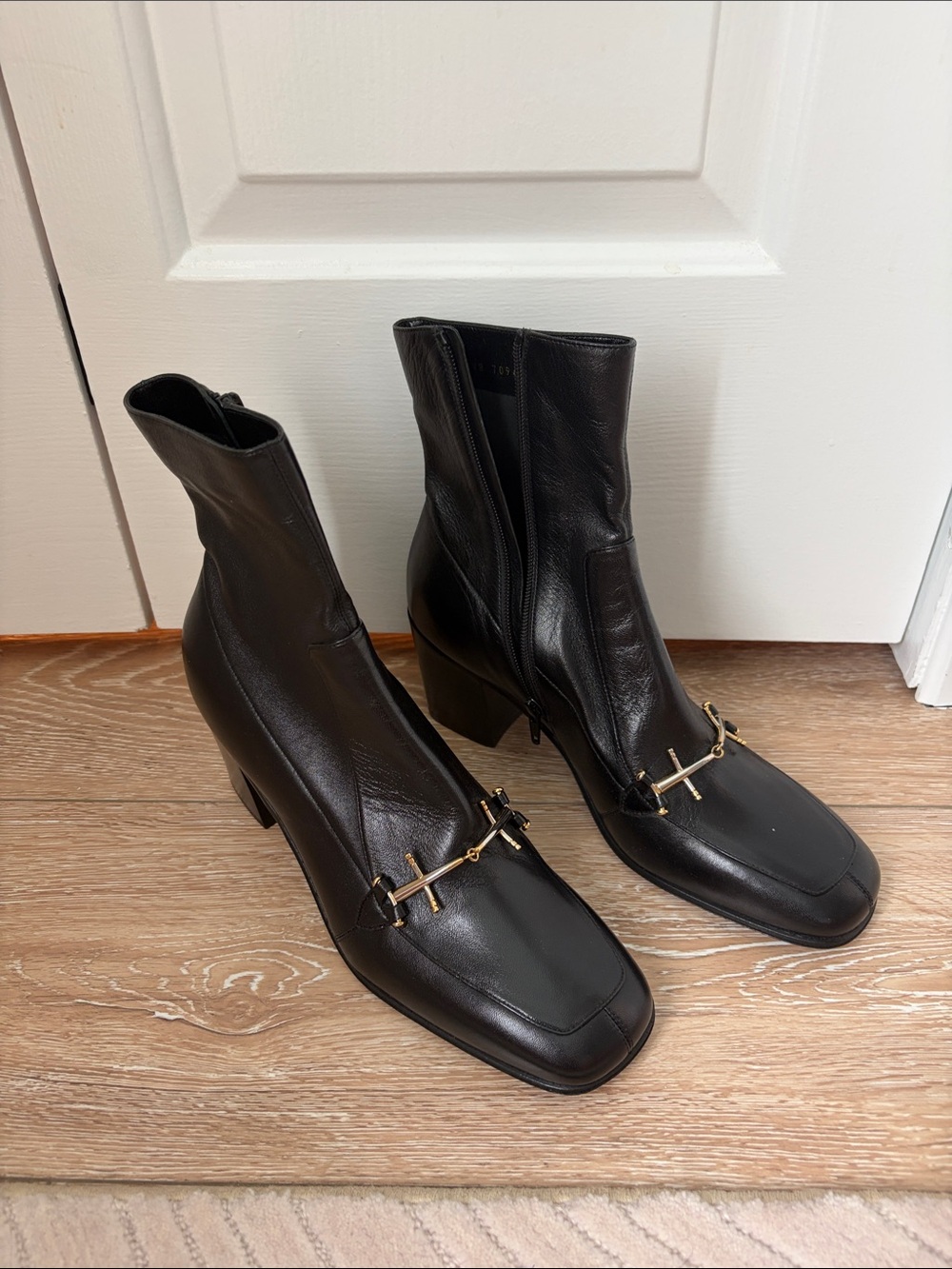 YSL Black Leather Ankle Boots with Gold Bit Detail